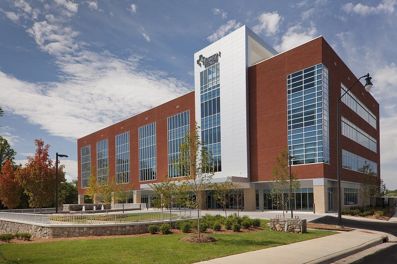 Modern brick and glass SECU Cancer Center building on the Mission Hospital campus in Asheville