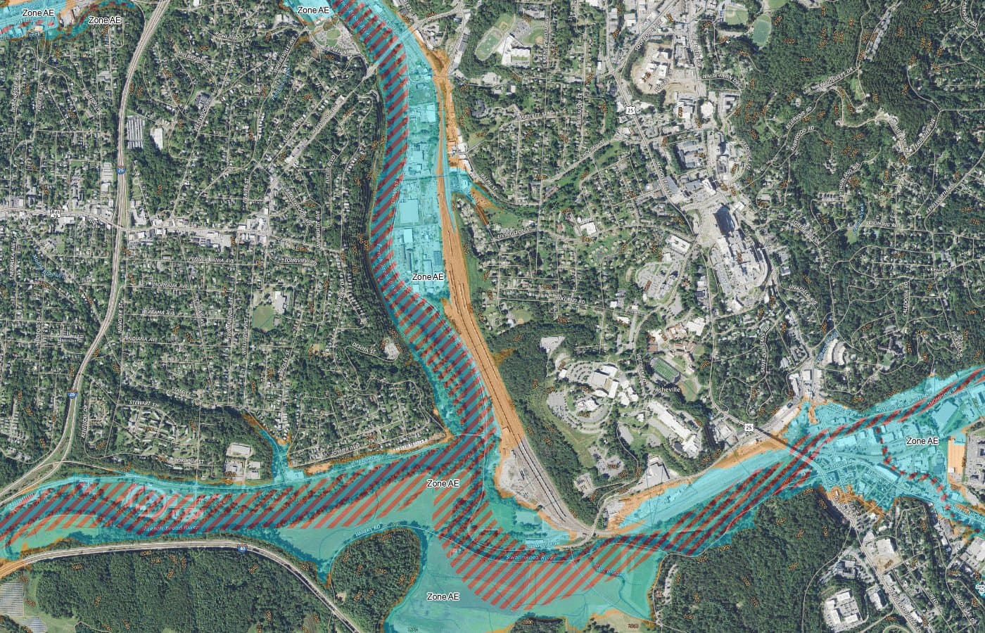 Aerial map of Asheville with FEMA flood hazard zones shaded blue and hatched red along the French Broad and Swannanoa rivers